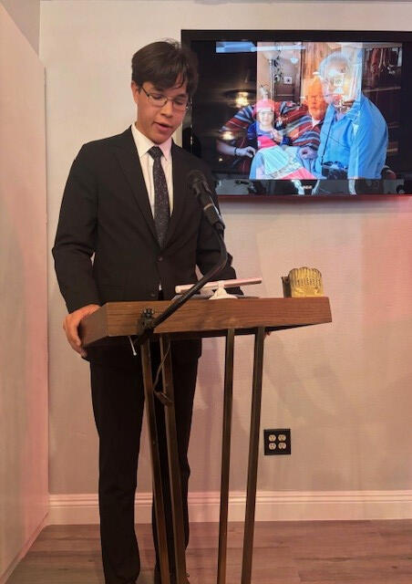 Tymen delivering the eulogy at the Celebration of Life for opa...